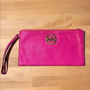 Micheal Kors hot pink wristlet clutch purse